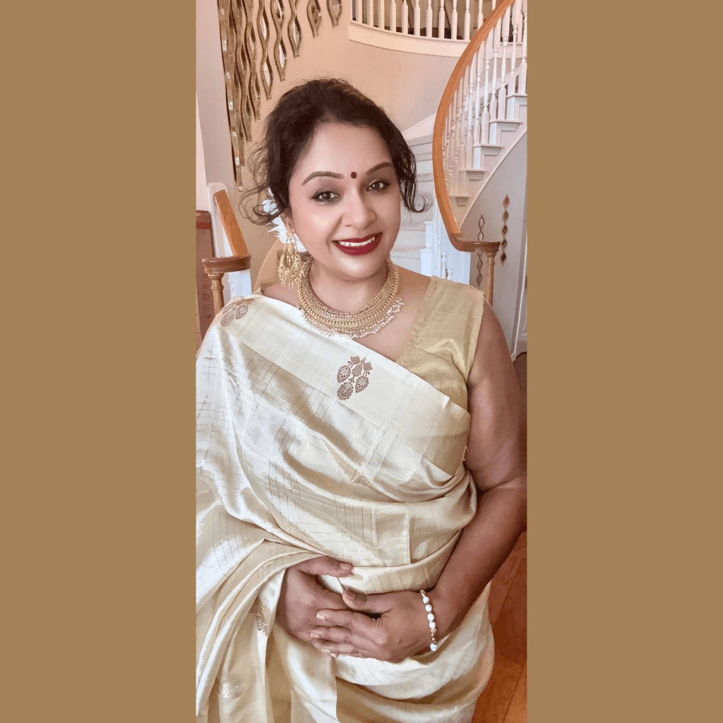 Close view of a richly woven Indian saree with gold zari